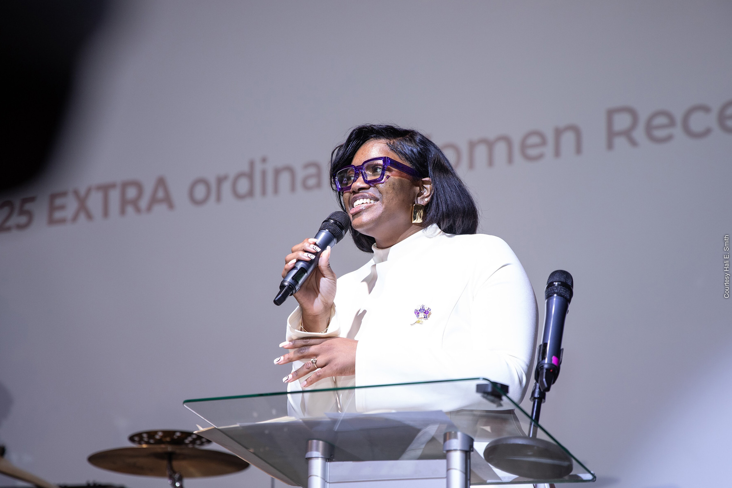 Hali E. Smith speaks at podium