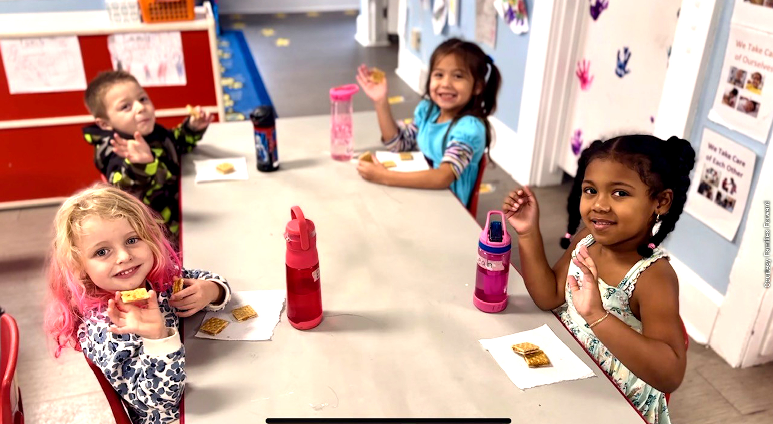 children eating around a table